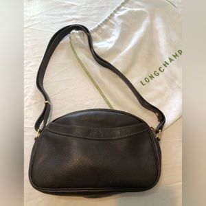 Longchamp pebbled leather dark brown purse.